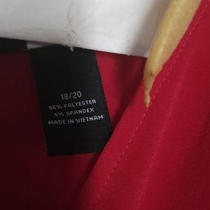 Red shirt v neck with tie to the back. Great with legging. Worn a few times.